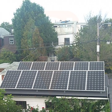 Solar power panels on garage rooftop